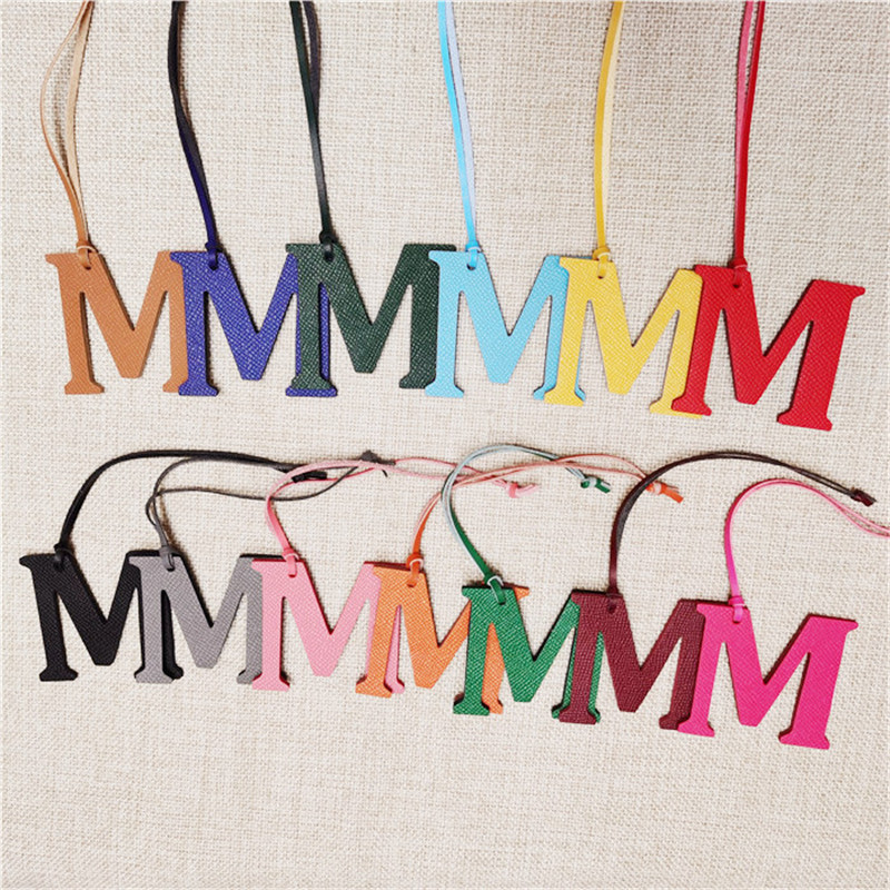 XMESSUN New English Letters M  - огляд і ціна Monogram Keychain Leather