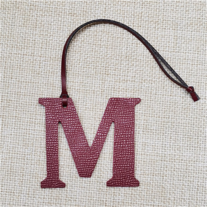 XMESSUN New English Letters M  - огляд і ціна Monogram Keychain Leather