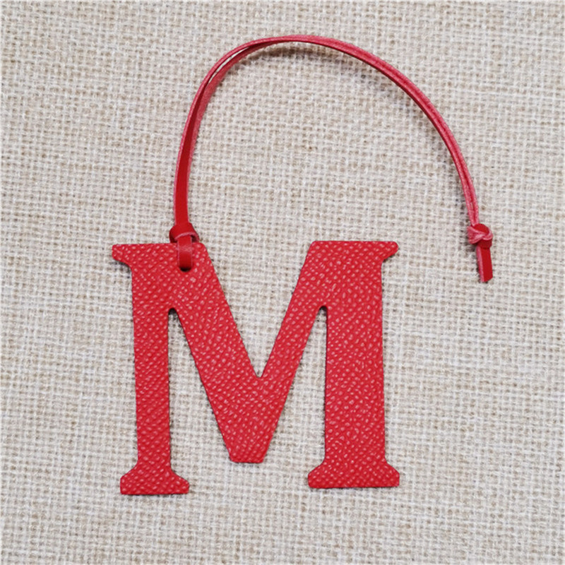 XMESSUN New English Letters M  - огляд і ціна Monogram Keychain Leather